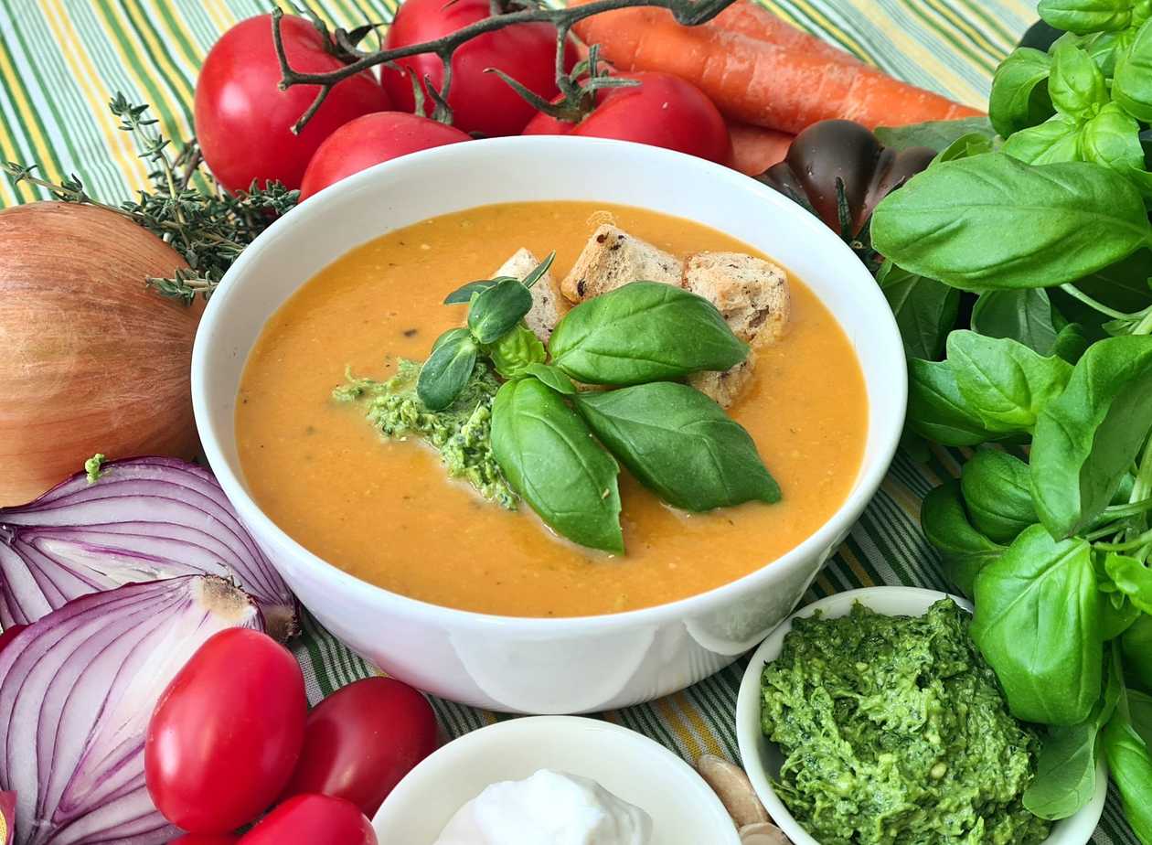 Tomato and Carrot Cream Soup with Basil Pesto