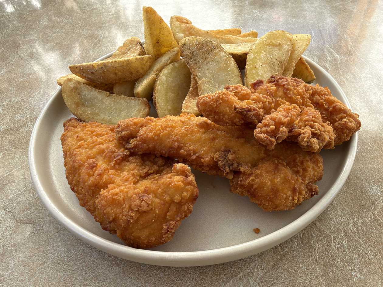 Crispy Chicken Strips with French Fries