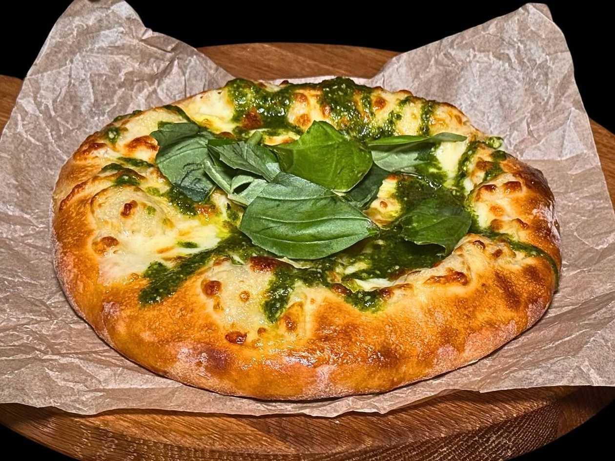 Khachapuri with tomatoes, basil & Pesto sause
